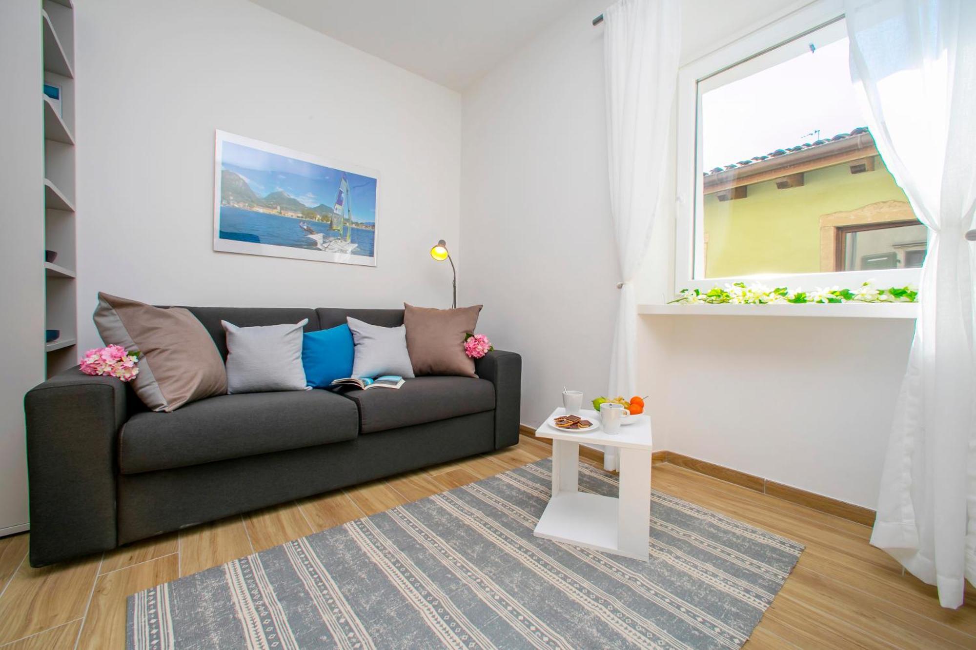 Nido Sui Tetti Di Riva Del Garda - Happy Rentals Exterior photo