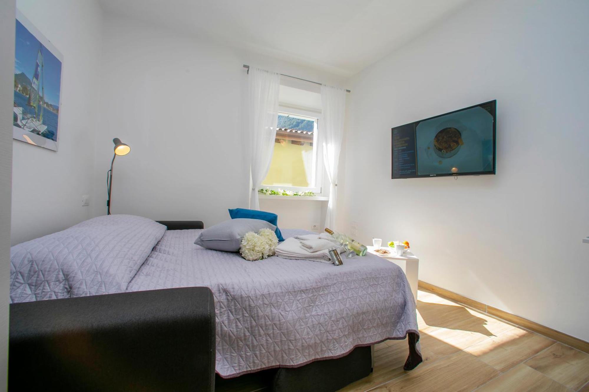 Nido Sui Tetti Di Riva Del Garda - Happy Rentals Exterior photo