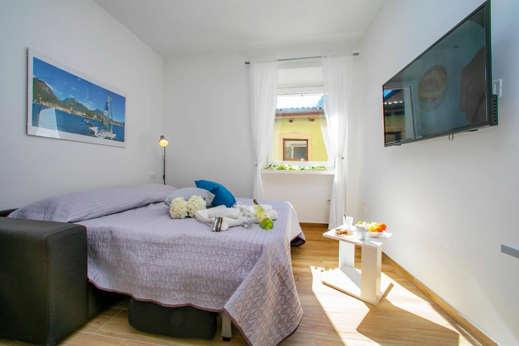 Nido Sui Tetti Di Riva Del Garda - Happy Rentals Exterior photo